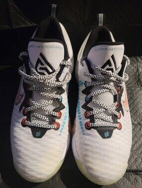 Nike Giannis Immortality Force Field sneakers with pastel accents.